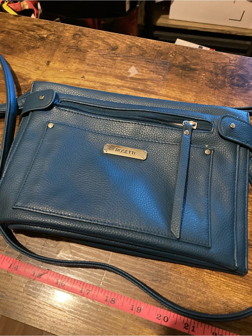 Rosetti teal pebbled crossbody bag